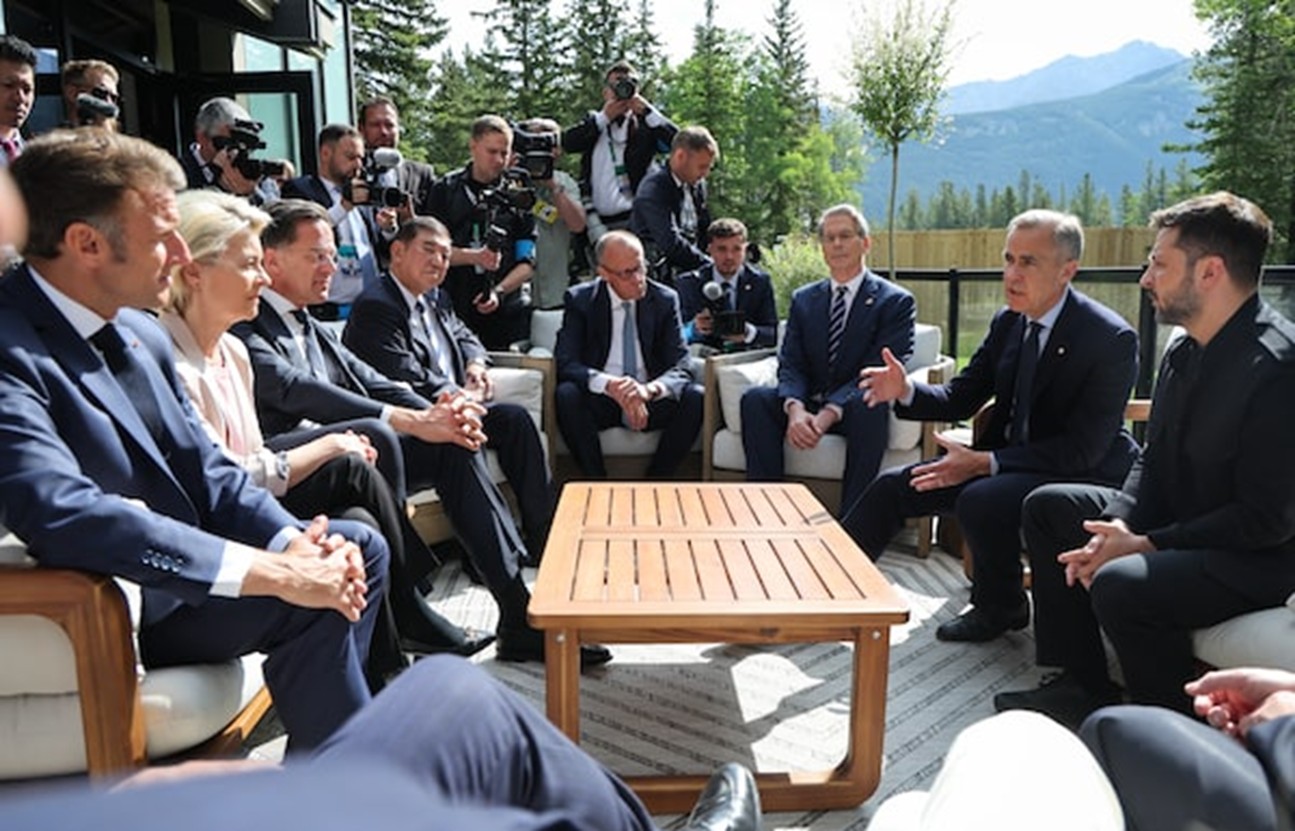 Prime Minister Mark Carney speaks with world leaders at the G7 summit in Kananaskis, Alta., on Tuesday. MARIN/AFP/Getty Images
